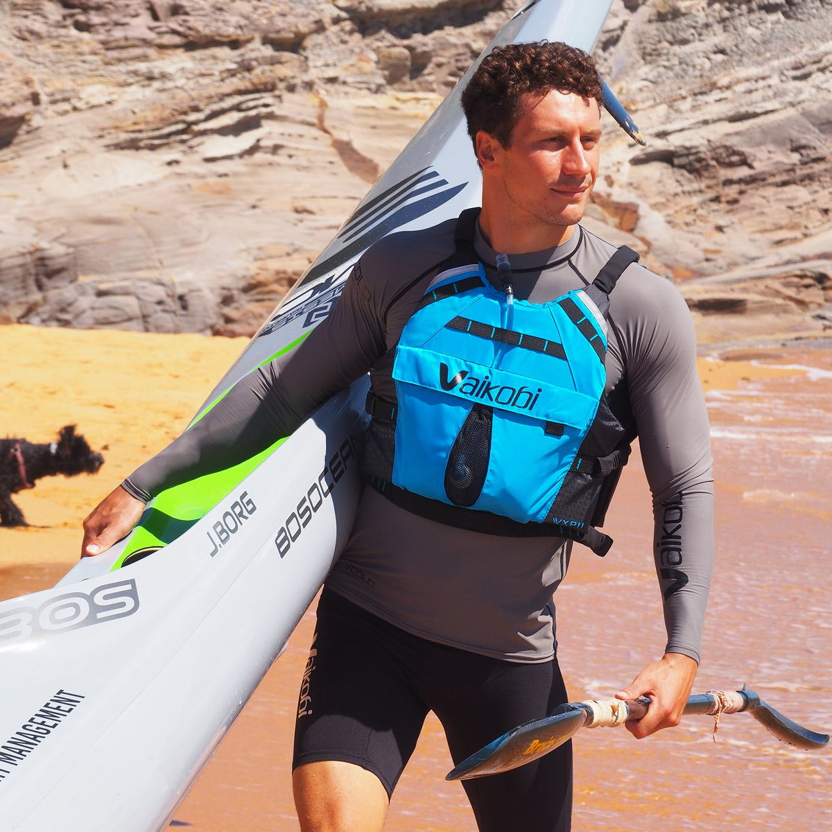 Vaikobi VXP II Race Lifejacket Cyan - paddler with surfski