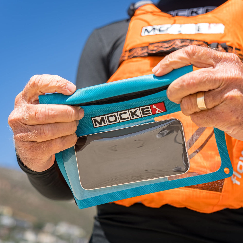 Mocke Cellphone Dry Bag turquoise, overhead view with phone inside