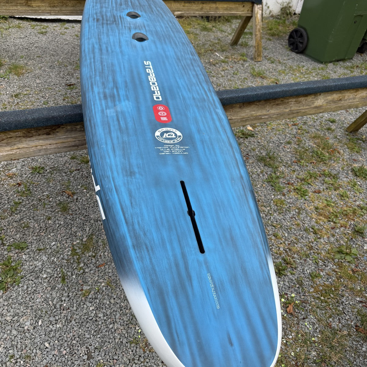 Starboard Sprint Zero 14'0 x 23.5 used - rail and red hull from tail