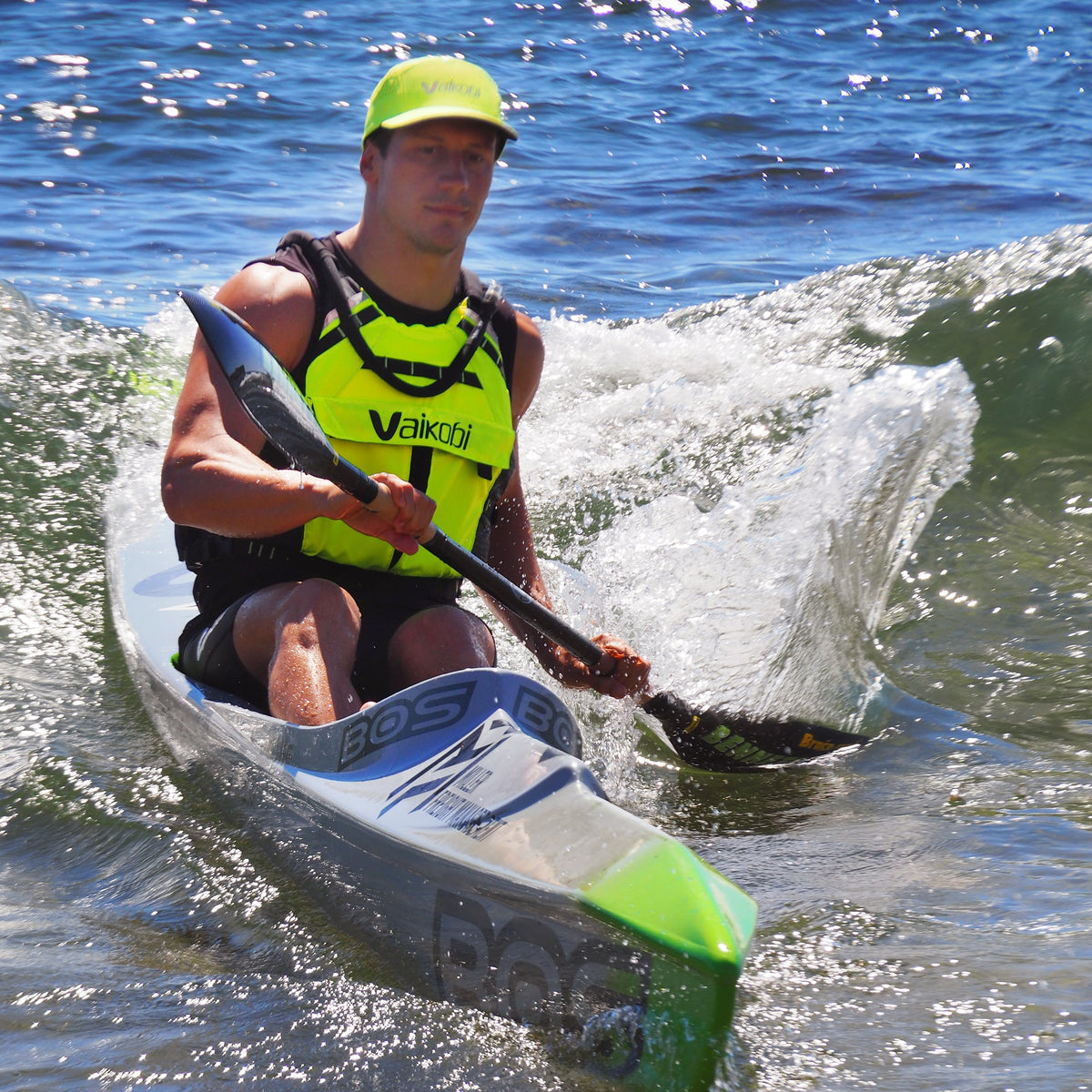 Vaikobi VXP II Race Lifejacket Yellow - paddler in waves