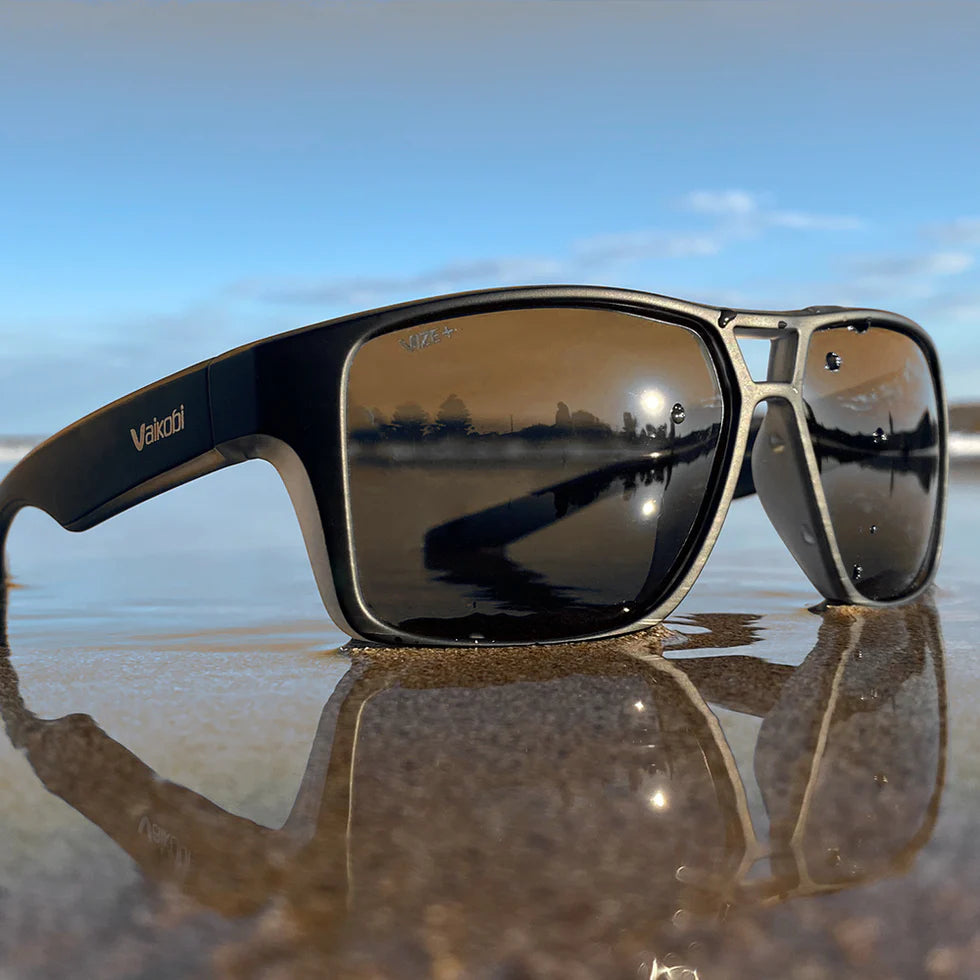 Vaikobi Molokai Sunglasses - immersed in water at beach