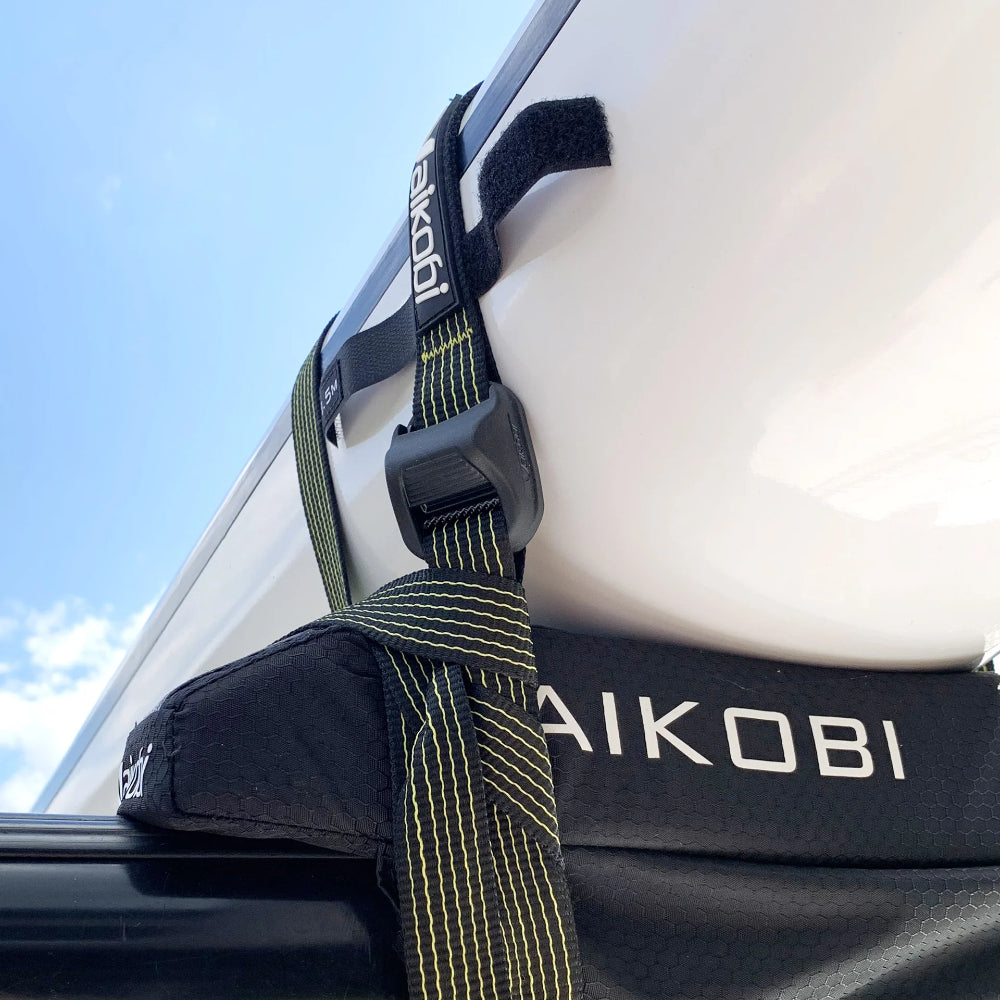 Vaikobi Tie Down Straps - for kayak transport, showing use on roff rack with surfski