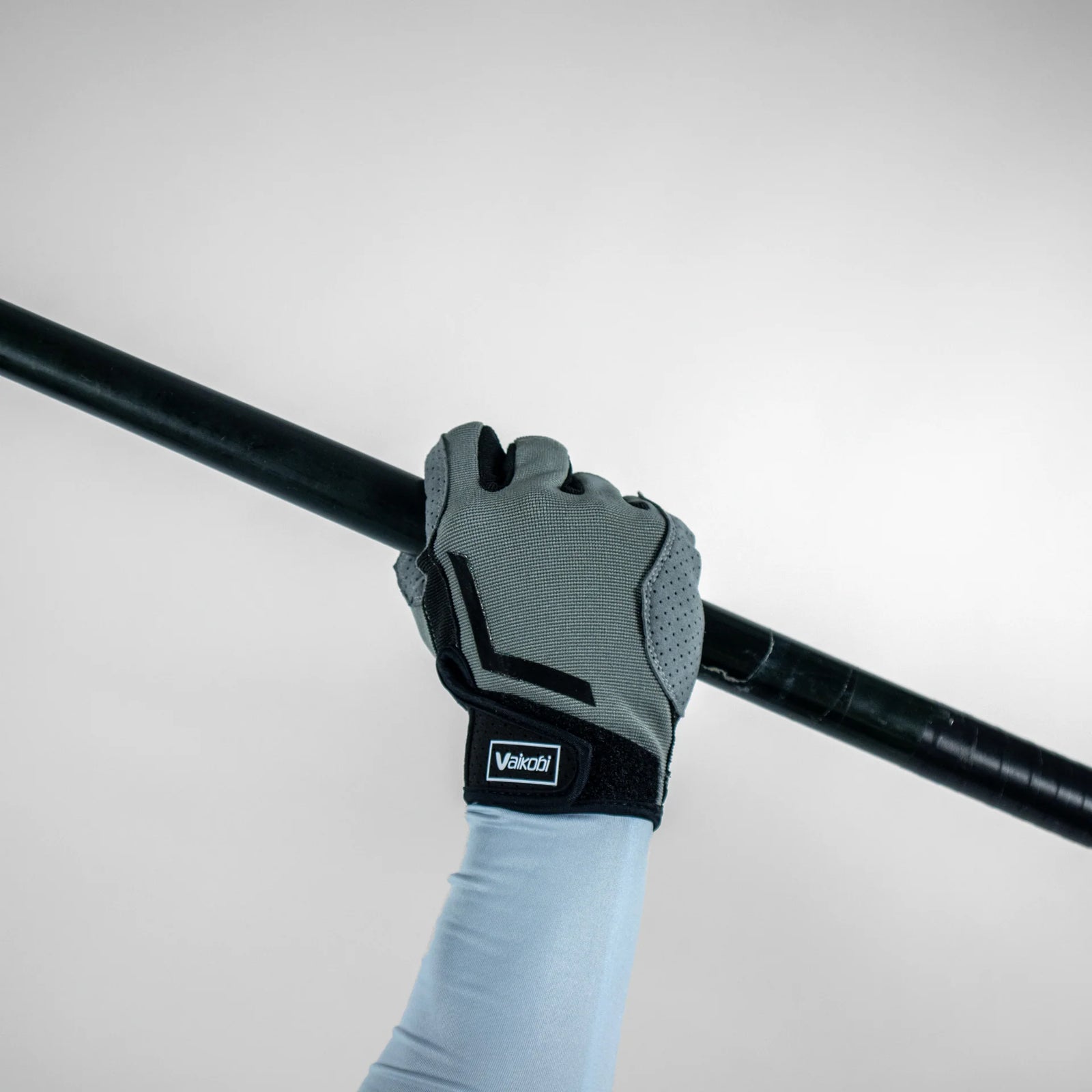Front view of Vaikobi V-Blade Paddle Glove worn on hand, showing palm side with silicone grip texture.